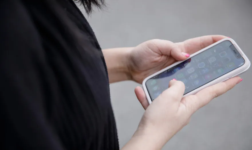 Student using their cell phone